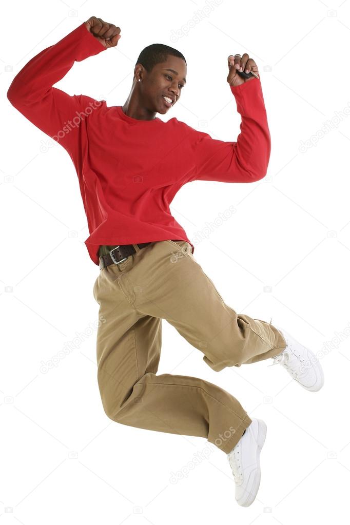 Casual Man Jumping For Joy with Car Keys