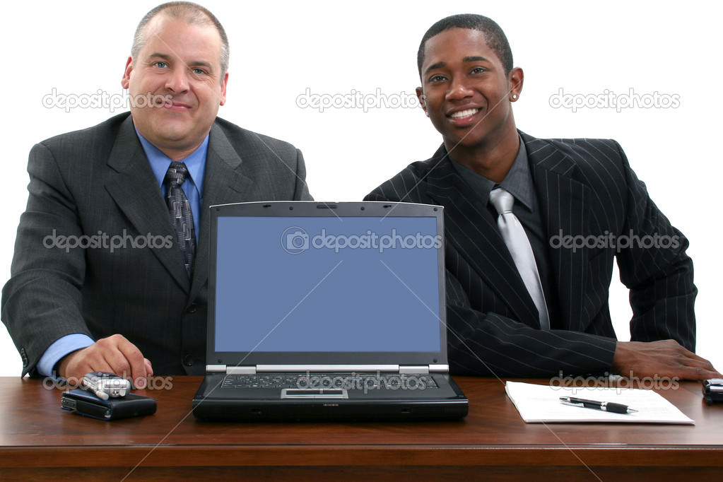 Businessmen at Desk with Laptop