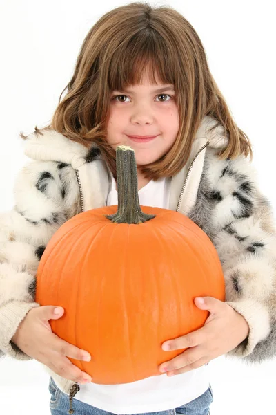 Belle fille de cinq ans avec citrouille — Photo