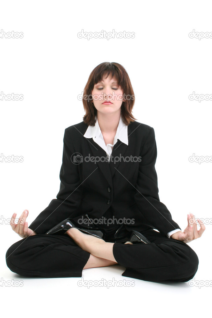 Beautiful Young Business Woman In Suit Meditating