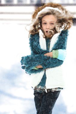 Cold Child in Snow Storm clipart
