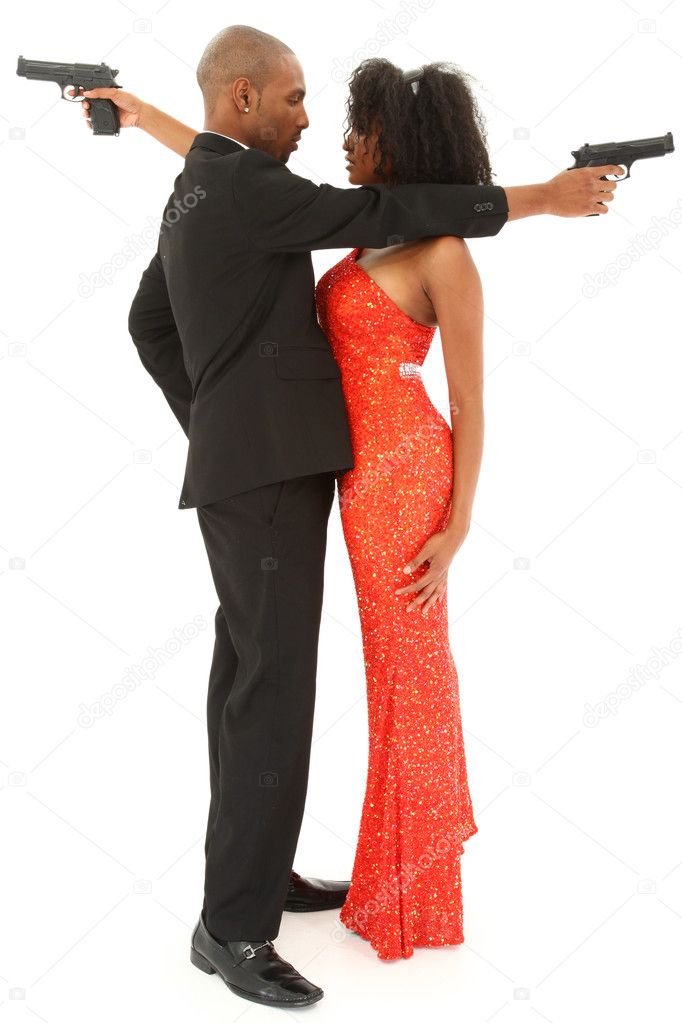Attractive Black Couple in Formalwear with guns