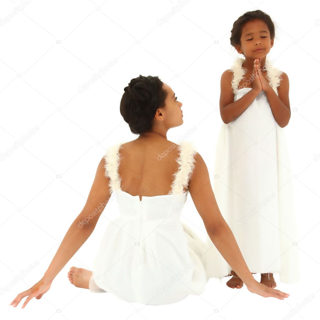 Beautiful black mother daughter portrait. Dressed as angels. Mom