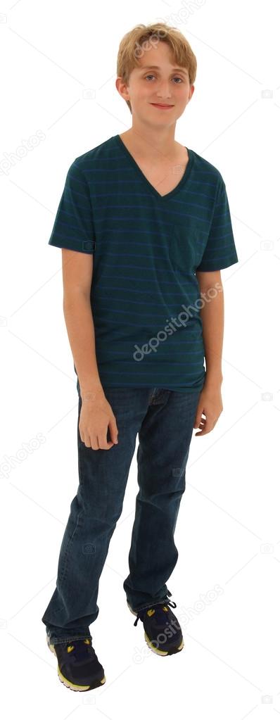 Handsome shy teen boy standing over white with clipping path.
