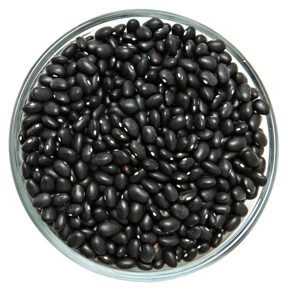 Skleněná mísa nemyté syrové černé fazole — Stock fotografie