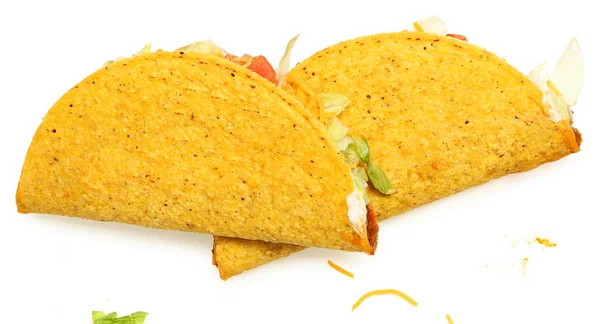 Δύο tacos στοιβάζονται σε λευκό φόντο με τυρί και μαρούλι — Φωτογραφία Αρχείου
