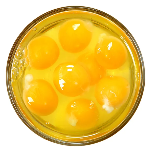 Ovos crus em tigela de vidro sobre branco — Fotografia de Stock