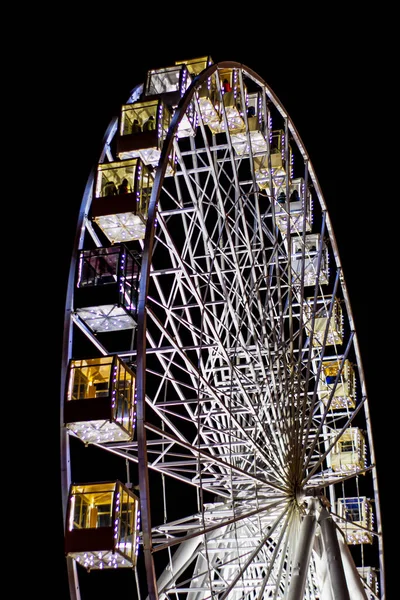 ferris wheel at night in the city