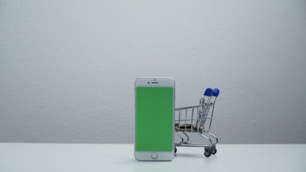 Stop Motion Cart Shopping Moving Smart Phone Green Screen — 图库视频影像