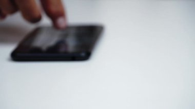 stop motion a men shopping online with smart phone and a cart shopping moving.