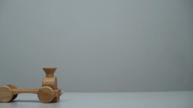 stop motion a car wooden toy.