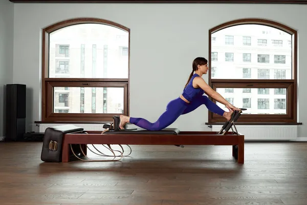 Pilates Reformer Woman Short Box Tree Exercise Stock Photo - Image