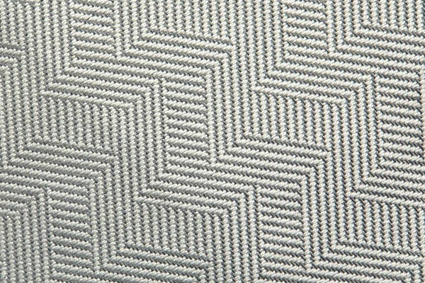 Tekstur rajutan. Tekstur kain jacquard dengan pola geometris abu-abu. Pola mosaik Crochet. — Stok Foto