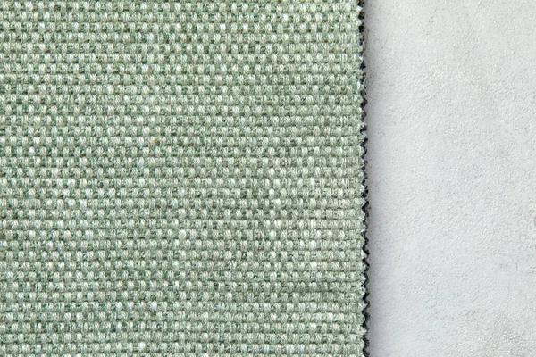 Latar belakang kain masterly dalam warna zaitun baru. Tekstur persegi mulus, ubin siap — Stok Foto
