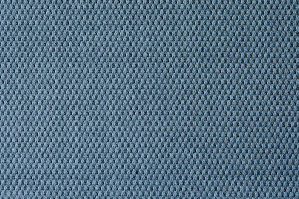 Knitted texture. Texture of jacquard fabric with gray blue geometric pattern. Crochet mosaic pattern