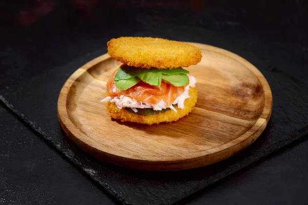 sushi menu with burger made from rice and smoked salmon, avocado, light cheese and nori.