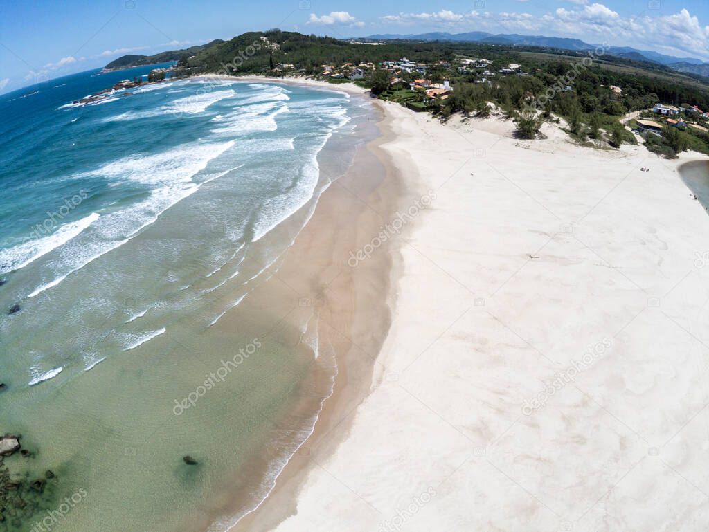 Aerial view of Beach with sand and forest, Praia da Barra, Garopaba, Santa Catarina, Brazil