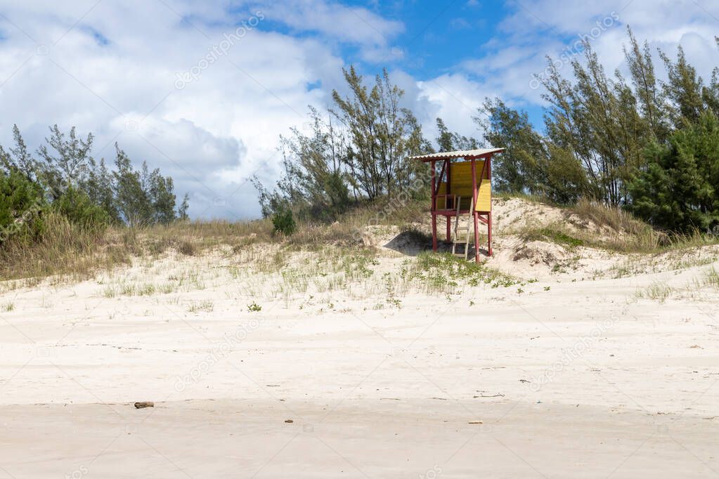 Lifeguard tower with sand and vegetation around, Ibiraquera, Santa Catarina, Brazil