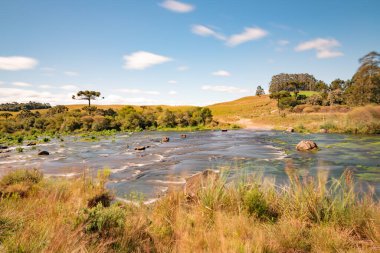 River and Dirty road in farm field, Cambara do Sul, Rio Grande do Sul, Brazil