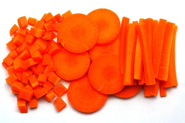 Fresh carrots sliced and diced — Stock Photo, Image