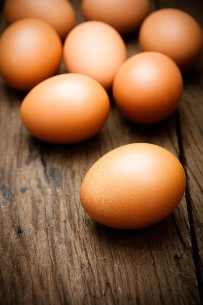 Eggs on wood background — Stock Photo, Image