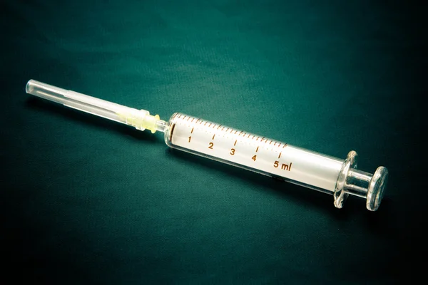 Ležela injekční stříkačka — Stock fotografie