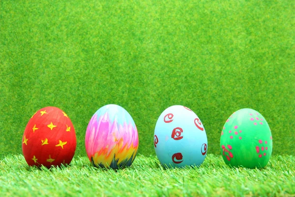 Easter eggs on grass background — Stock Photo, Image