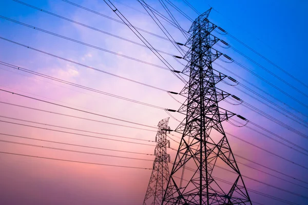 High voltage post and sky in twilight time — Stock Photo, Image