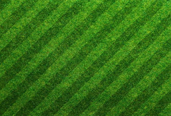Зеленый травяной футбол — стоковое фото