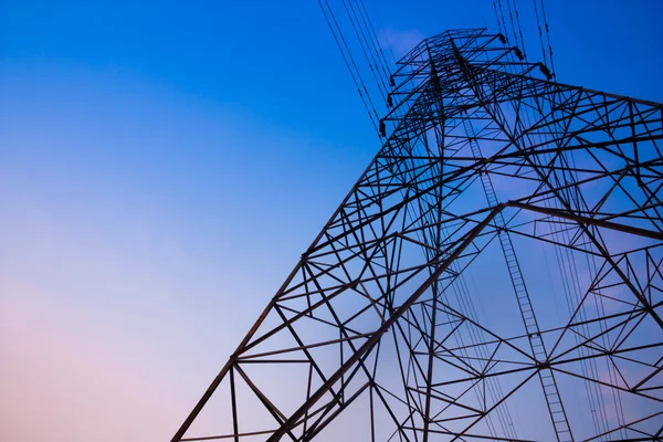 High voltage post and sky in twilight time — Stock Photo, Image