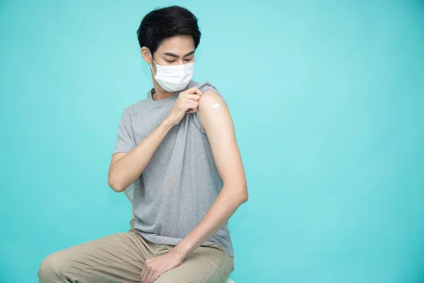 Young Asian Man Wearing Mask Receive Covid Virus Vaccine Looking — Zdjęcie stockowe