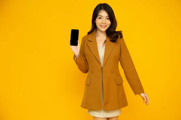Portrait Asian Business Woman Yellow Suit Showing Presenting Mobile Phone — Photo