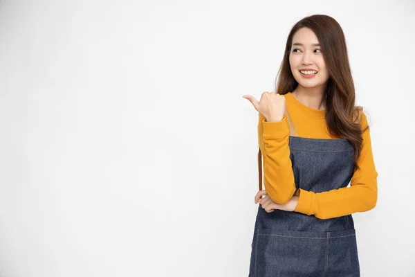 Happy Young Asian Female Housewife Wearing Kitchen Apron Cooking Pointing — Stock Photo, Image