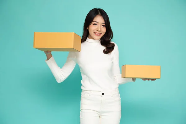 Happy Asian Woman Holding Package Parcel Box Isolated Light Green — 스톡 사진