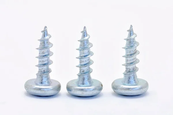 Three steel screw — Stock Photo, Image