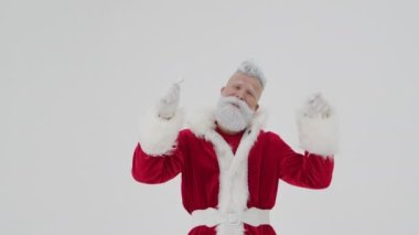 Neşeli Noel Baba, modern hayatta teknolojinin kullanıldığı sayfaları silmeyi teklif ediyor..
