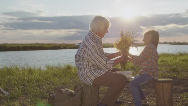 Happy Old Grandmother Little Granddaughter Together Laugh Reading Book Story — Stockvideo