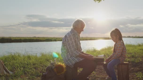 Happy Old Affectionate Grandmother Reading Interesting Book Fairy Tale Little — Vídeo de Stock