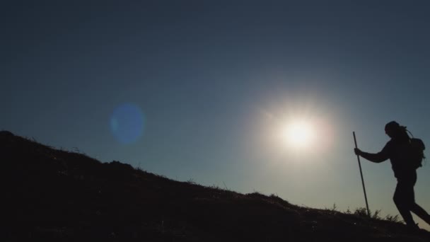 Active Man Uses Trekking Pole Climb High Hill Back Sunset — Stockvideo