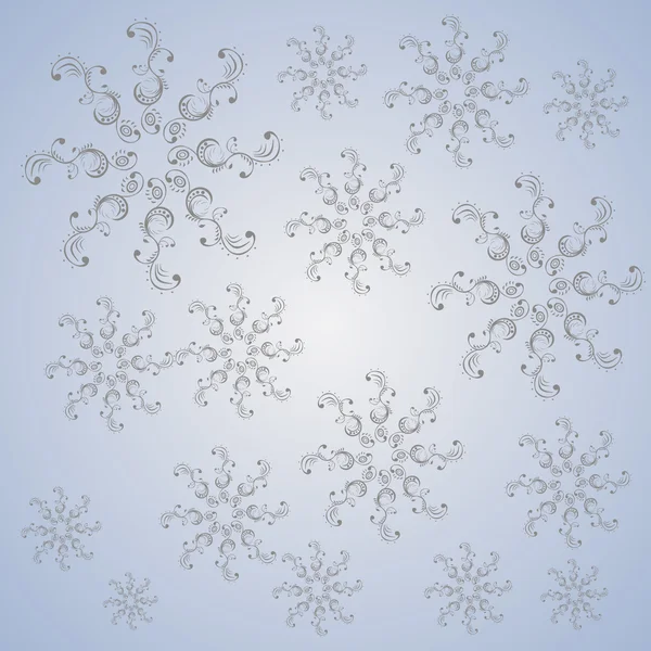 Copos de nieve de Navidad sobre un fondo azul-gris — Archivo Imágenes Vectoriales