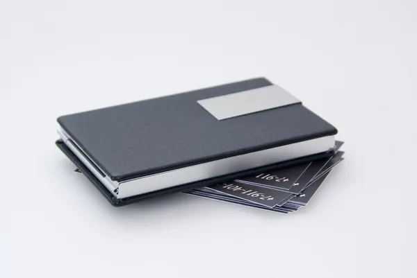 Titular de tarjeta negra y tarjetas de visita — Foto de Stock