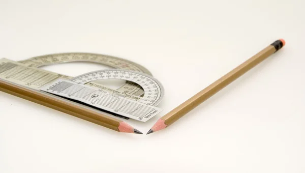 Protractor and two pencils — Stock Photo, Image