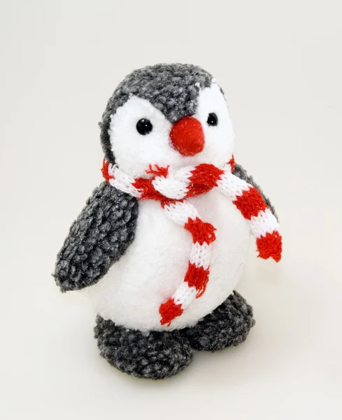 Penguin toy in scarf — Stock Photo, Image