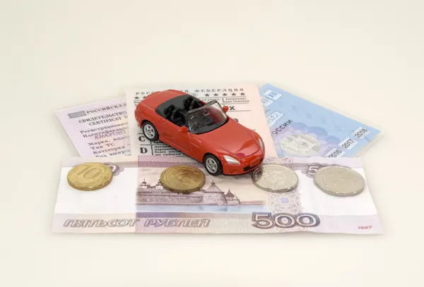 Red toy car, money and documents — Stock Photo, Image