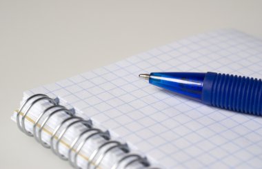 Blue pen and notebook clipart