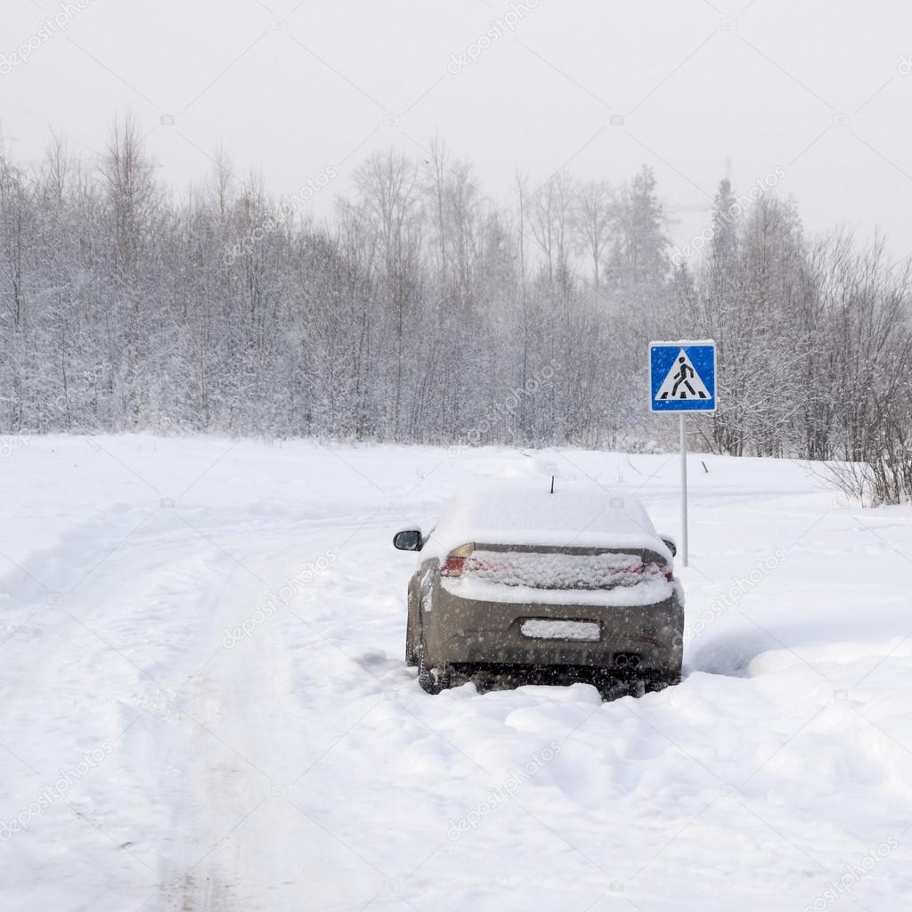 Car parked on russian winter road