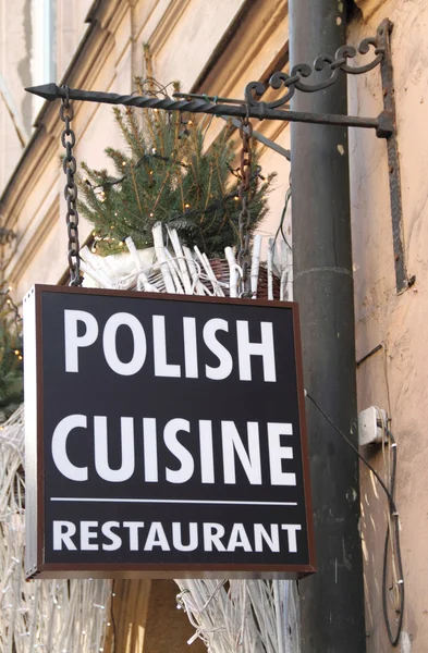 Sign on the wall at the restaurant of Polish cuisine in the cent — Stock Photo, Image