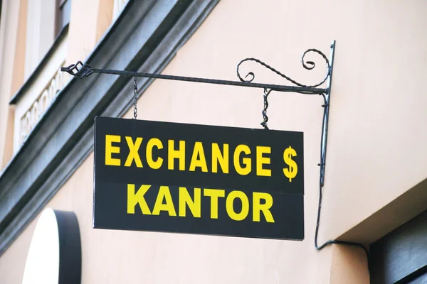 Signboard "Currency exchange" in English and Polish — Stock Photo, Image