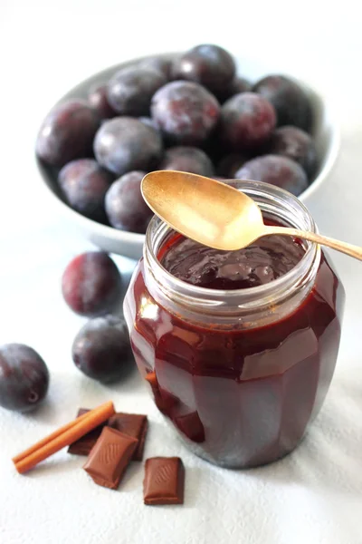 Plum jam with chocolate and cinnamon — Stock Photo, Image