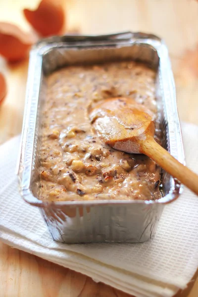 Mix of flour, eggs, bananas and chopped dark chocolate and walnu — Stock Photo, Image